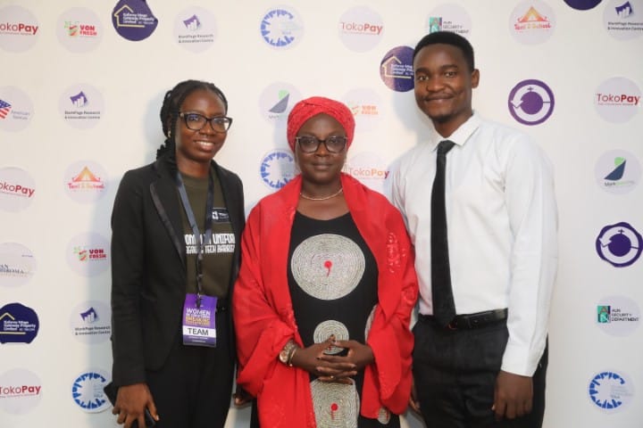 Toko Academy hosts with a guest at the Women in Uniform event in Yola