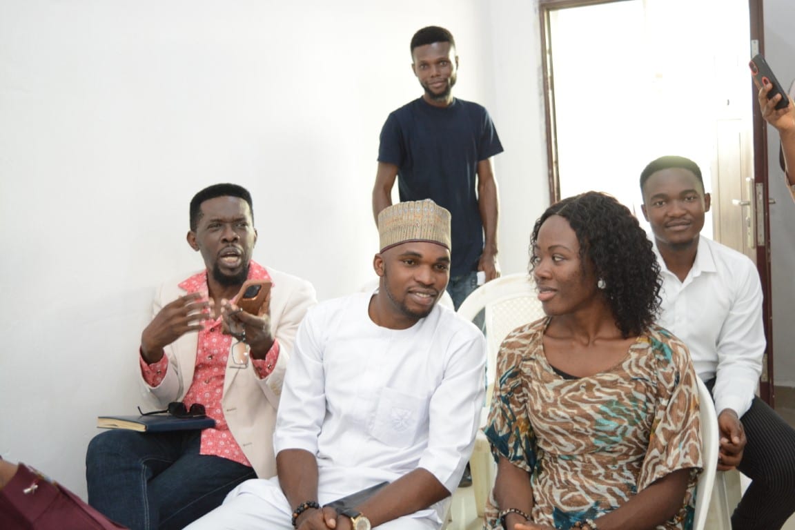 Young adults at a Toko Academy session in Yola, mid-discussion