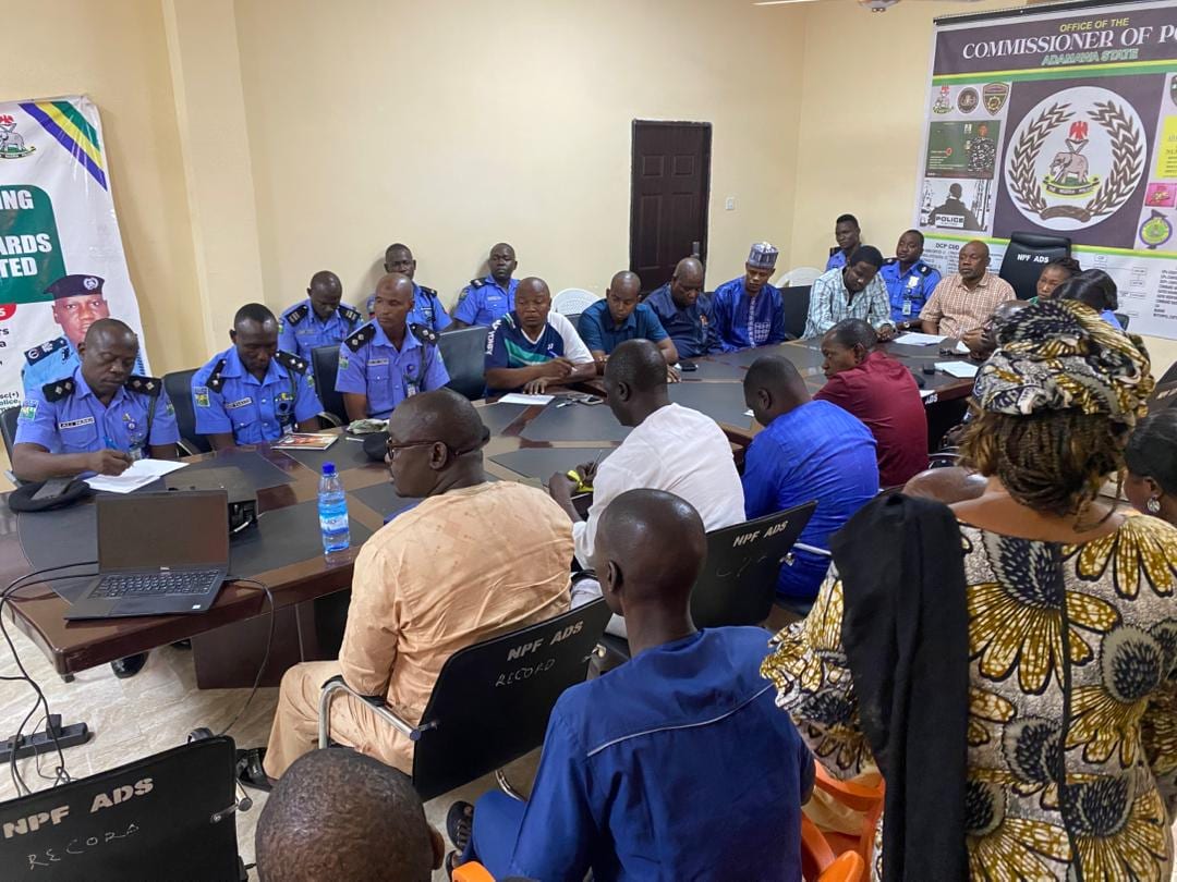 Officers from federal agencies at laptops during a Toko Academy training session