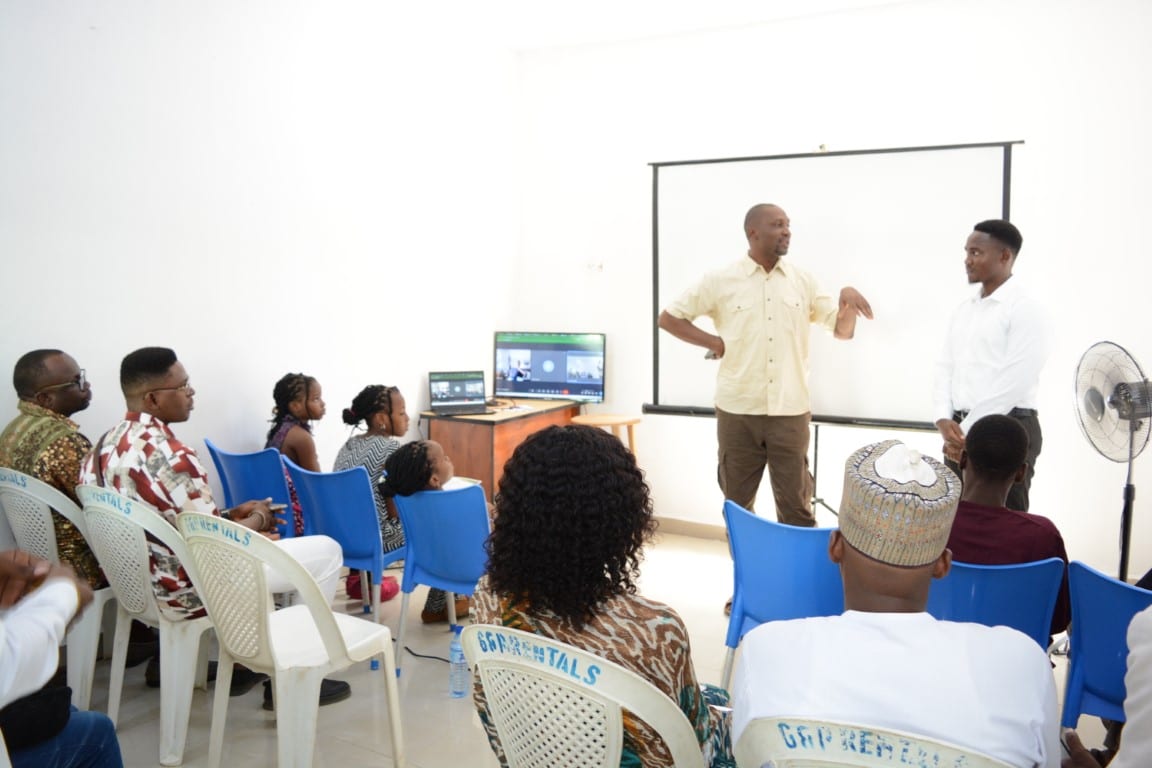 Two Toko Academy facilitators leading a session in front of the class